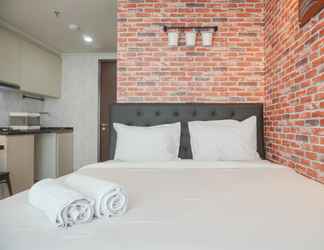 Bedroom 2 Homey and Simple Studio Green Sedayu Apartment By Travelio