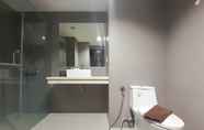 In-room Bathroom 5 Homey and Exclusive 2BR Patraland Amarta Apartment By Travelio