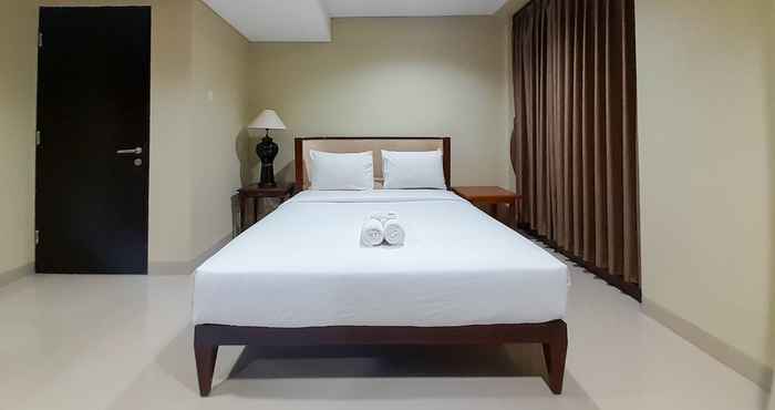 ห้องนอน Homey and Exclusive 2BR Patraland Amarta Apartment By Travelio
