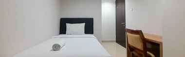 Bedroom 2 Homey and Exclusive 2BR Patraland Amarta Apartment By Travelio