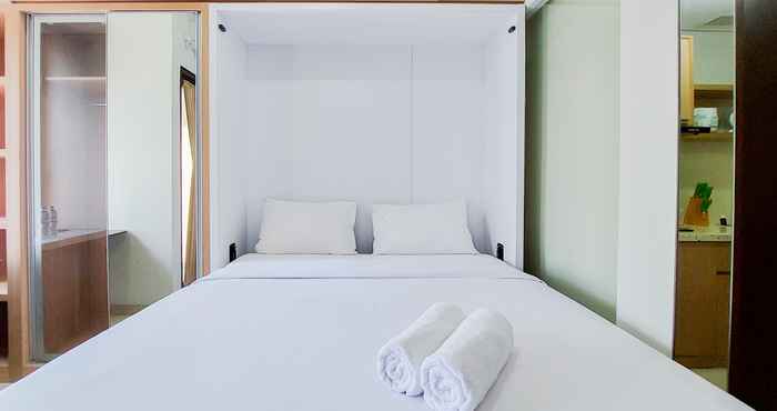 Bedroom Homey and Best Price Studio Transpark Bintaro Apartment By Travelio