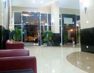 Lobby 2 Cozy Living Studio Apartment at Pakubuwono Terrace By Travelio