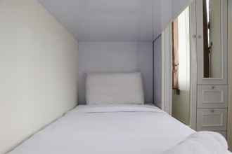 Bedroom 4 Comfort 2BR at 30th Floor Transpark Cibubur Apartment  By Travelio