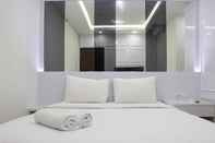 Bedroom Comfort 2BR at 30th Floor Transpark Cibubur Apartment  By Travelio