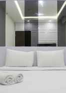 BEDROOM Comfort 2BR at 30th Floor Transpark Cibubur Apartment  By Travelio