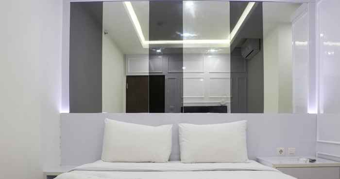 Bedroom Comfort 2BR at 30th Floor Transpark Cibubur Apartment  By Travelio