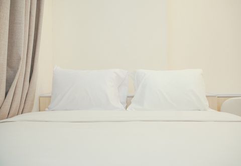 Bedroom Tranquil and Simple 2BR at Tokyo Riverside PIK 2 Apartment By Travelio