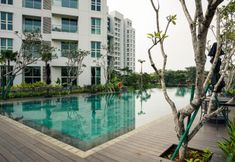 Swimming Pool 6 Homey and Nice 1BR at Citralake Suites Apartment By Travelio