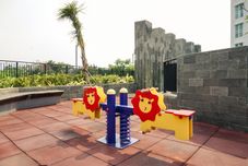 Entertainment Facility Homey and Nice 1BR at Citralake Suites Apartment By Travelio