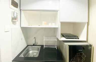 Lobi 2 Homey 1BR Apartment without Living Room at Amartha View By Travelio