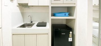 Common Space 2 Homey and Minimalist Studio Room at Amartha View Apartment By Travelio