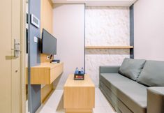 Common Space 2 Modern and Comfort 1BR at Gold Coast Apartment By Travelio