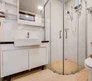 In-room Bathroom 3 Nice and Spacious 3BR at Sky House BSD Apartment By Travelio