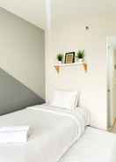 BEDROOM Nice and Modern Studio at Springlake Summarecon Bekasi Apartment By Travelio