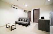 Lobby 2 Cozy and Good Location 1BR at Praxis Apartment By Travelio