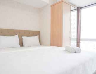Bedroom 2 Homey 2BR Apartment at Tokyo Riverside PIK 2 By Travelio
