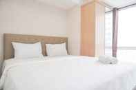 Bedroom Homey 2BR Apartment at Tokyo Riverside PIK 2 By Travelio