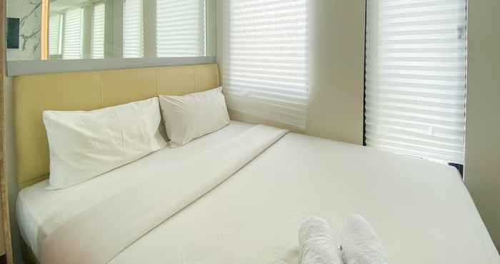 Bilik Tidur Cozy and Relaxing Studio at Osaka Riverview PIK 2 Apartment By Travelio