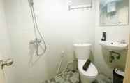 Toilet Kamar 3 Homey and Elegant Studio at Amartha View Apartment By Travelio