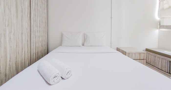 Kamar Tidur Nice and Fancy Studio Apartment at Tuscany Residence By Travelio