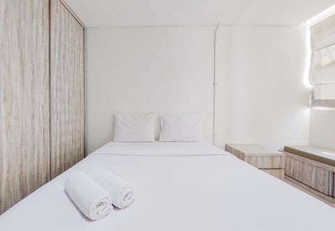 Kamar Tidur Nice and Fancy Studio Apartment at Tuscany Residence By Travelio