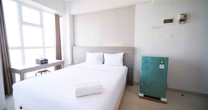 Bedroom Clean and Tidy Studio Apartment at Taman Melati Surabaya By Travelio