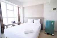 Bedroom Clean and Tidy Studio Apartment at Taman Melati Surabaya By Travelio