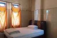 Bedroom Hotel Mulia Kendari Mitra RedDoorz