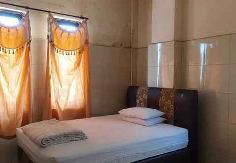 Bedroom Hotel Mulia Kendari Mitra RedDoorz