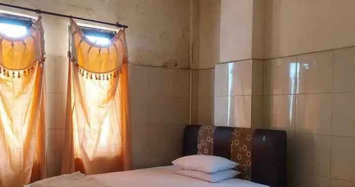 Bedroom Hotel Mulia Kendari Mitra RedDoorz