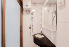 In-room Bathroom 5 Cozy Living Studio Sky House BSD Apartment By Travelio