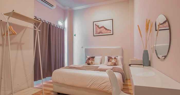 Bedroom Krisan Guest House Syariah Mitra RedDoorz