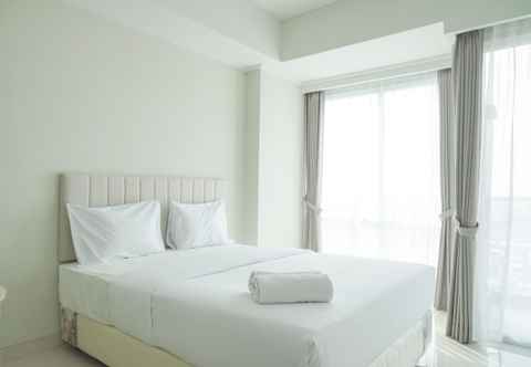 Kamar Tidur Simply Look Studio Apartment at Green Sedayu By Travelio