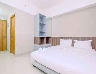 Bedroom 2 Nice and Strategic Studio at Gateway Park LRT City Bekasi Apartment By Travelio