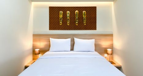 寝室 2 Homey and Stunning 2BR Apartment Mustika Golf Residence By Travelio