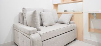 Lobby 2 Homey and Scenic 1BR Gold Coast Apartment near PIK By Travelio