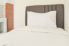 Bedroom Homey and Minimalist Studio Green Bay Pluit Apartment By Travelio