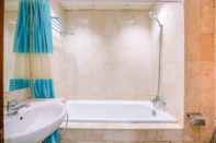 In-room Bathroom Homey and Wonderful 2BR Apartment Bellagio Residence By Travelio