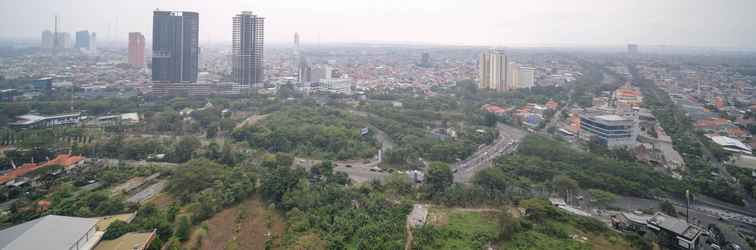 Sảnh chờ Cozy and Modern 2BR at Grand Sungkono Lagoon Apartment By Travelio