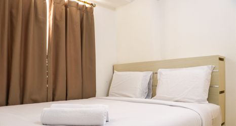 Bedroom 2 Modern and Comfort 2BR at Bassura City Apartment By Travelio