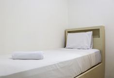 Bedroom 2 Modern and Comfort 2BR at Bassura City Apartment By Travelio