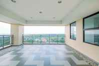 Lobby Comfort and Modern 2BR Transpark Cibubur Apartment By Travelio