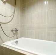 In-room Bathroom 4 Homey and Cozy Studio at Vasanta Innopark Apartment By Travelio