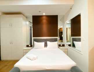 Kamar Tidur 2 Homey and Cozy Studio at Vasanta Innopark Apartment By Travelio