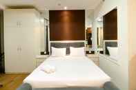 Bedroom Homey and Cozy Studio at Vasanta Innopark Apartment By Travelio