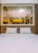 BEDROOM Minimalist and Warm Studio Room Transpark Cibubur Apartment By Travelio