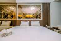 Bedroom Minimalist and Warm Studio Room Transpark Cibubur Apartment By Travelio
