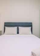 BEDROOM Homey and Modern Look 2BR Transpark Cibubur Apartment near Mall By Travelio