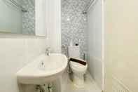 In-room Bathroom Fully Furnished with Cozy Design Studio Tokyo Riverside PIK 2 Apartment By Travelio
