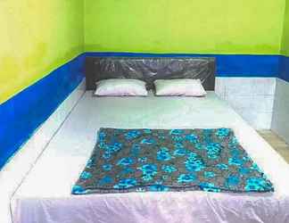 Bedroom 2 Hotel Indah Grogot Syariah Mitra RedDoorz